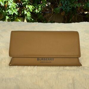Burberry sunglasses case.